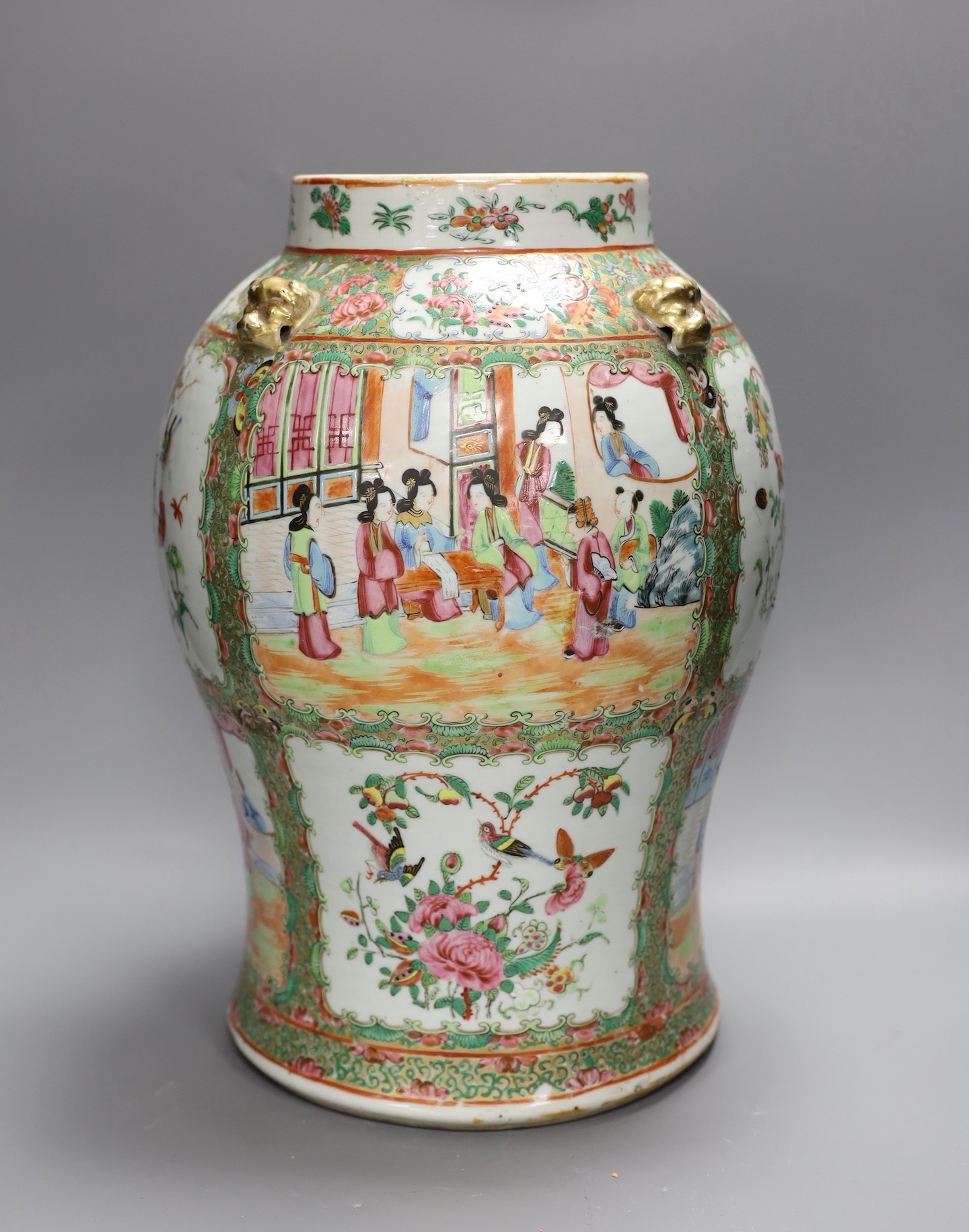 A large Chinese Canton decorated famille rose jar, 19th century, 39 cms high